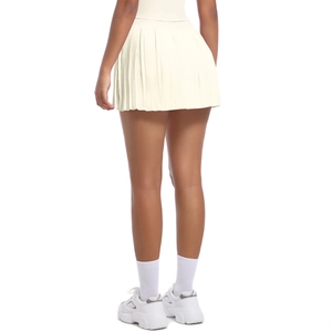 Rear view of pleated cream tennis skirt with quick-dry fabric and built-in liner