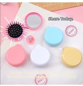 Foldable macaron hairbrush with mirror in candy colors, shown in pink, blue and white