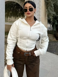 Slim fit white zip-up hoodie with waist cinching design and drawstring hood for women