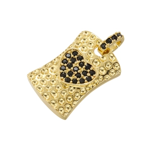 Macro view of gold-plated rectangle pendant with black pavé heart-shaped crystal inlay