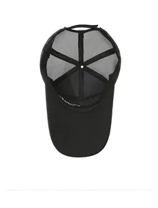 Close-up of the breathable mesh lining and adjustable strap inside a black baseball cap