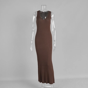 Detailed texture of dark brown V-neck sleeveless knitted long dress with ribbed pattern