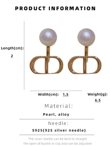 Detail view of pearl D letter stud earrings with S925 silver needle size specifications