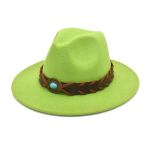 Detail of neon green wool fedora hat with woven band and oval blue stone buckle