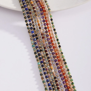 Multicolor natural stone beaded necklace with gold metal spacers and faceted gemstones