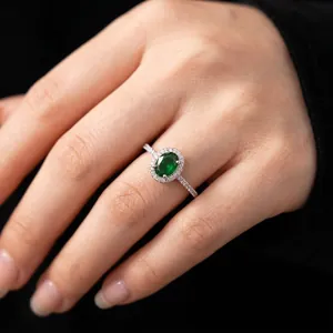 Elegant adjustable silver ring with green oval gemstone and micro-pave cubic zirconia