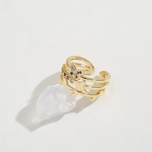 Elegant gold butterfly ring with colorful cubic zirconia stones and layered open band design