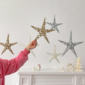 Sparkly glitter star ornaments in gold, silver, and white for Christmas wall decorations
