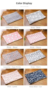 Detailed grid of soft coral fleece pet mats with various star, bear and paw print patterns
