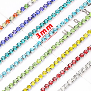 Close-up of 3mm stainless steel tennis chains in multiple vibrant rhinestone colors