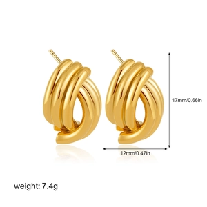 Detailed view of 18K gold twisted earrings with dimensions 17mm by 12mm and weight 7.4g