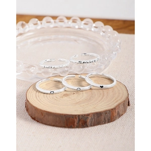 Set of 5 minimalist S925 silver open rings with smile and lucky engraving on wood