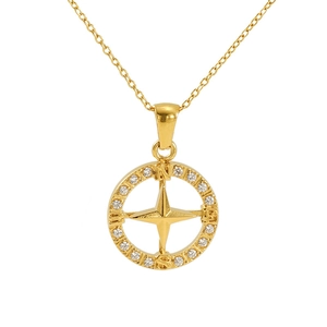 Close-up of gold compass pendant featuring a star center and sparkling zircon halo