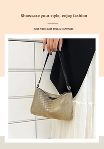 Detailed view of luxury gold rhinestone evening clutch bag with zip and black strap