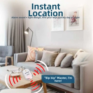Wireless key finder on a coffee table with alarm sound and LED light guidance features