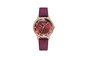 Close-up view of elegant women's quartz watch with red dial and leather strap
