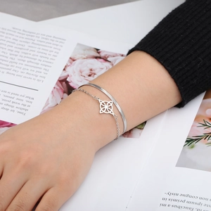 Double-layer silver stainless steel bracelet featuring snake chain and hollow pendant