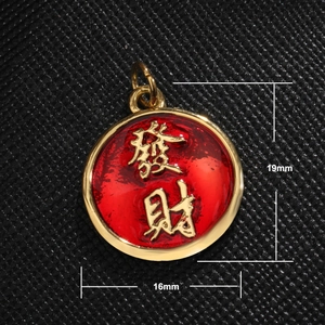 Detail showing 19x16mm gold-plated red enamel lucky charm with Chinese character
