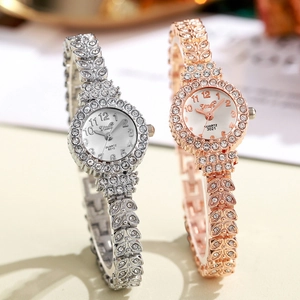 Elegant silver and rose gold women's watches with crystal bezels and minimalist round dials