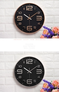 Detail of 10 inch wall clock showing 3D embossed numbers and leather texture dial