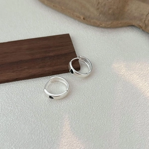 Minimalist S925 sterling silver hoop earrings with black enamel heart patterns for women