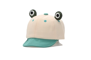 Close-up of baby baseball cap with cartoon frog design and soft cotton brim texture