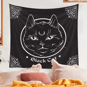 Detail of a black and white cat tapestry with mystical patterns for wall decoration