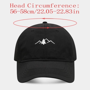 Detail of mountain embroidery on black quick-dry cap with 56-58cm head size info