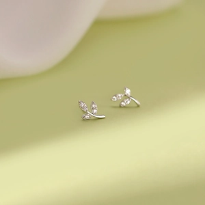 Elegant S999 sterling silver leaf stud earrings with sparkling cubic zirconia inlay