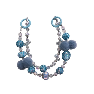 Handcrafted blue beaded phone strap with stylish faux fur pom poms and diverse textured beads
