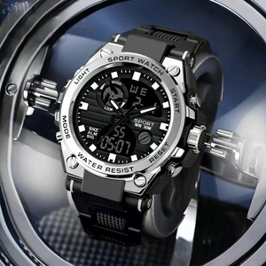 Macro shot of waterproof sports watch showing dual display and functional metal buttons