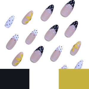French dot floral almond press-on nails with black white dots and yellow flower patterns