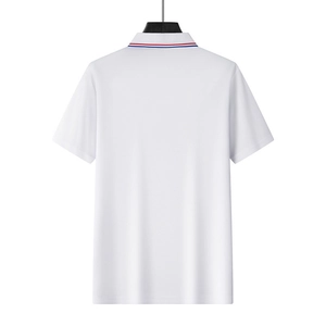 Rear view of white short-sleeved men's polo shirt with red and blue striped collar detail