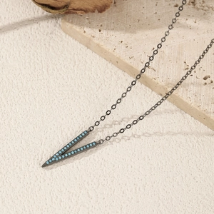 S925 sterling silver V-shape long necklace with turquoise beads on a stone background