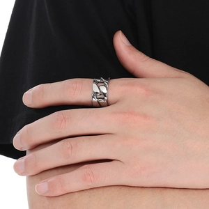 Close-up of a men's wide hollow Cuban link ring made of silver stainless steel