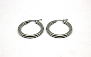 Detail of 3mm thick stainless steel hoop earrings with secure click-top closure clasp