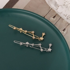 Star constellation hair clips with rhinestones in gold and silver plating