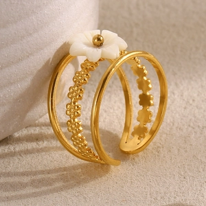 Elegant 18K gold plated stainless steel open ring featuring a white flower shell detail