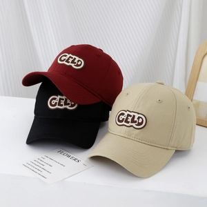 Kids baseball cap featuring GELD letter embroidery in burgundy black and beige colors