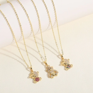 Charming gold bear necklaces with pink, yellow and colorful heart-shaped zircon pendants