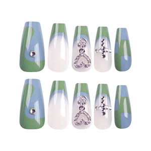 Blue-green plaid press-on nails with silver hearts and cross charms in coffin shape