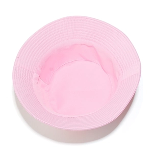 Detail view of pink cotton bucket hat showing reinforced stitching and breathable fabric