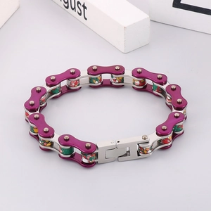 Detailed macro of motorcycle chain bracelet with purple finish and speckled rollers