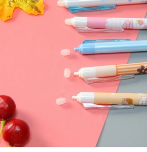 Detailed view of colorful patterned erasable gel pens with floral decorative accents