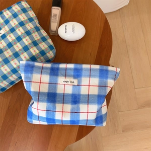 Blue and white checkered canvas cosmetic bag and flat pouch set with simple wish label
