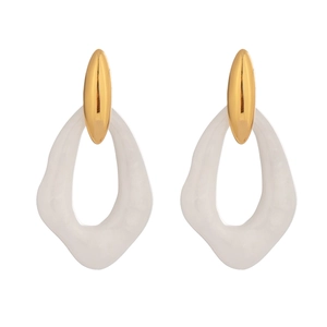 Detail of gold oval metal and irregular white resin drop earrings for women