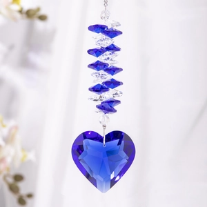Detailed view of faceted blue heart crystal suncatcher with elegant bead chain