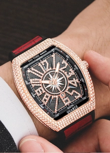 Macro detail of men's tonneau iced-out watch with rose gold case and bicolor silicone strap