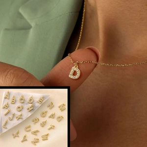 Golden micro-paved zircon 26 letter pendant necklace with sparkling double-loop detail