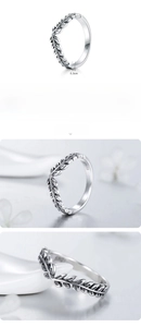 Macro shot of V-shaped silver ring showing 0.3cm width and 2.1g weight details